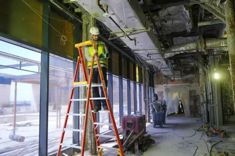 Construction helpers and laborers on site